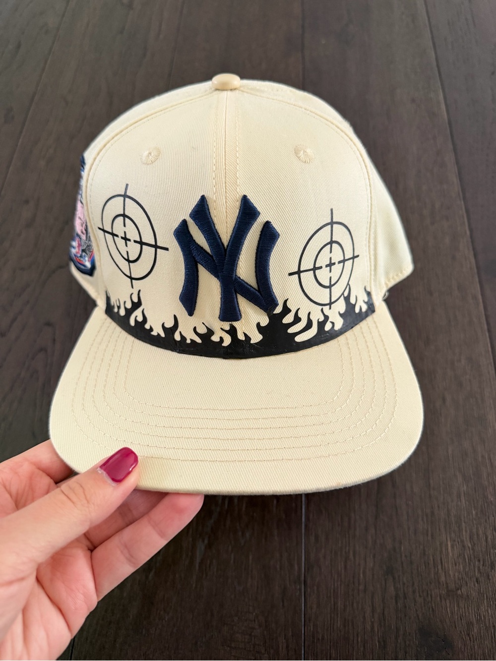 Collection B Beige Baseball Cap with Navy Embroidery and Black Flame Trim